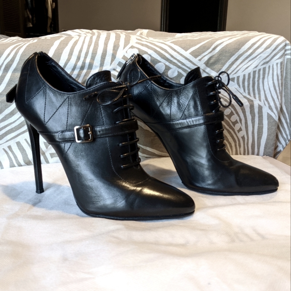 Prada high heel booties with laces in black leather